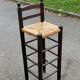 High bar stool in dark solid wood and straw 75cm