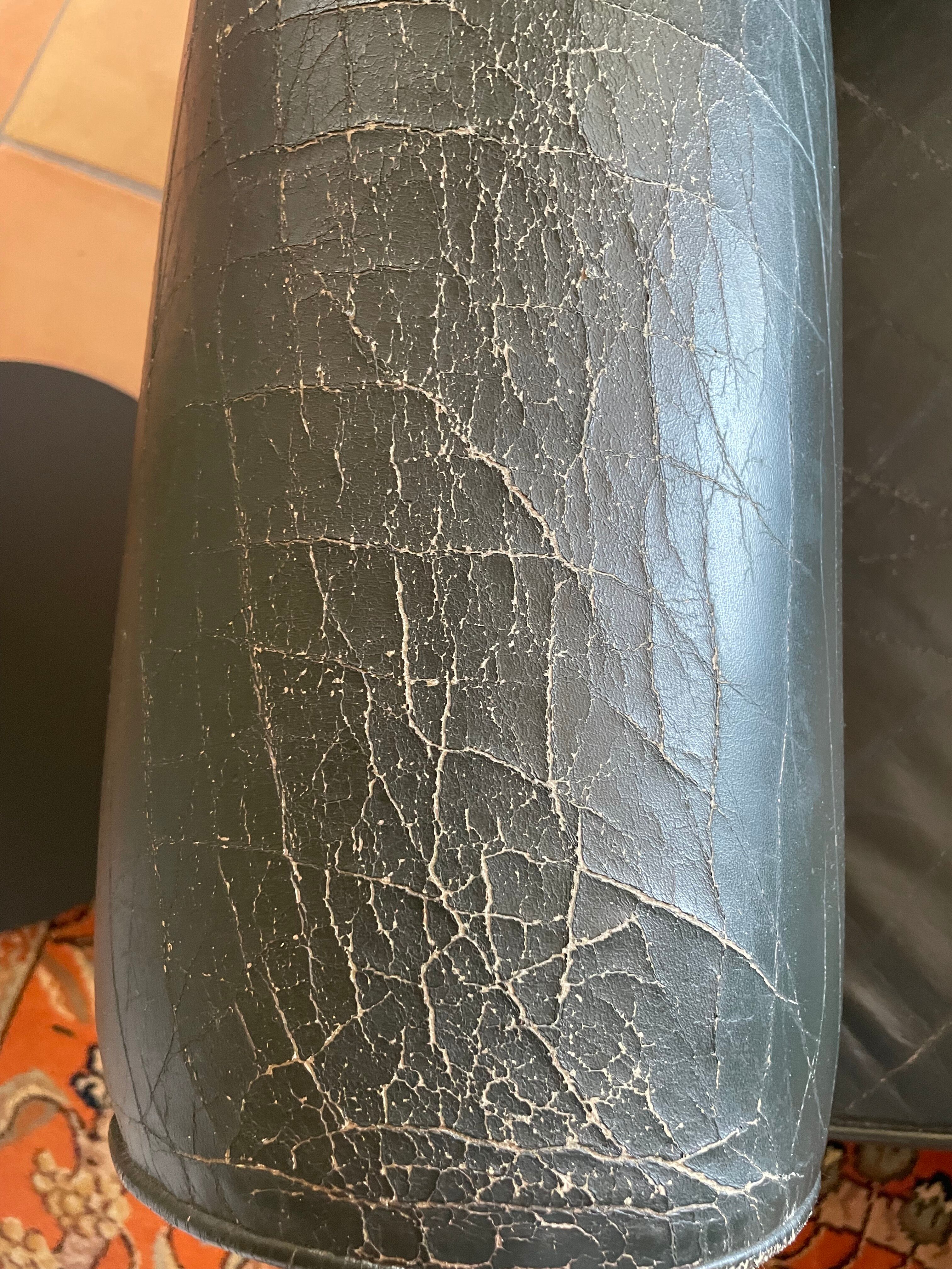 Green leather club chairs