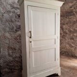 Antique French pine wardrobe with original white paint, circa 1900–1920.