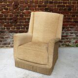 Fauteuil en velour beige et franges