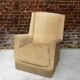 Fauteuil en velour beige et franges