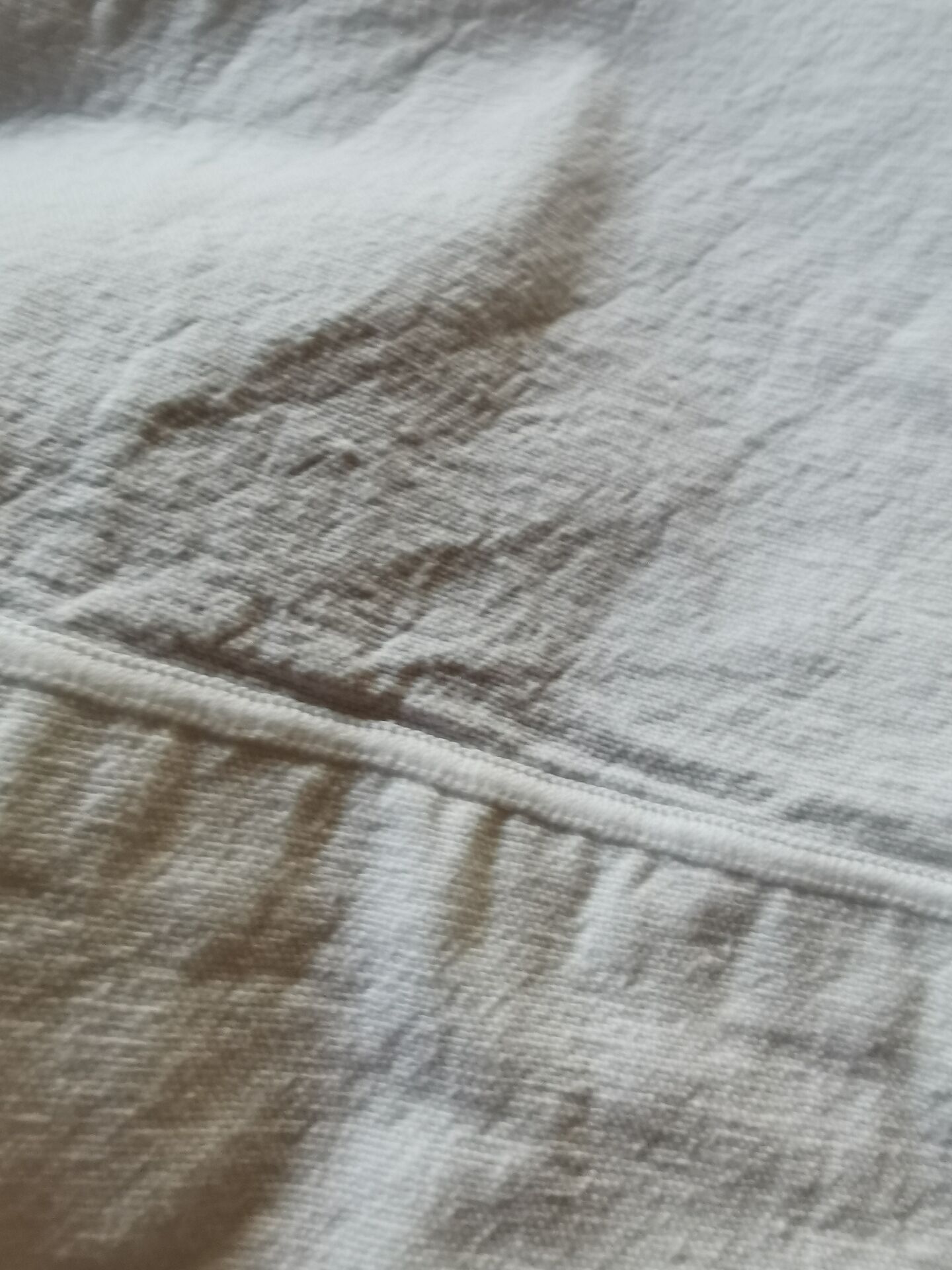 Antique monogrammed fabric