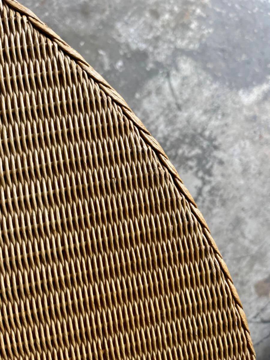Natural Lloyd Loom paper cord rattan round table with brass-capped legs by Vincent Sheppard