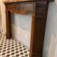 Louis XV-style oak mantelpiece