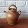 Vintage handmade brown glazed stoneware gargoulette.