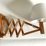 Extendable wall light by Translandia