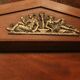 Mahogany pediment and half-column mirror and 118x91cm Empire-style bronze ornament