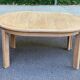 Table à manger scandinave ronde extensible décapée en chêne brut 1970