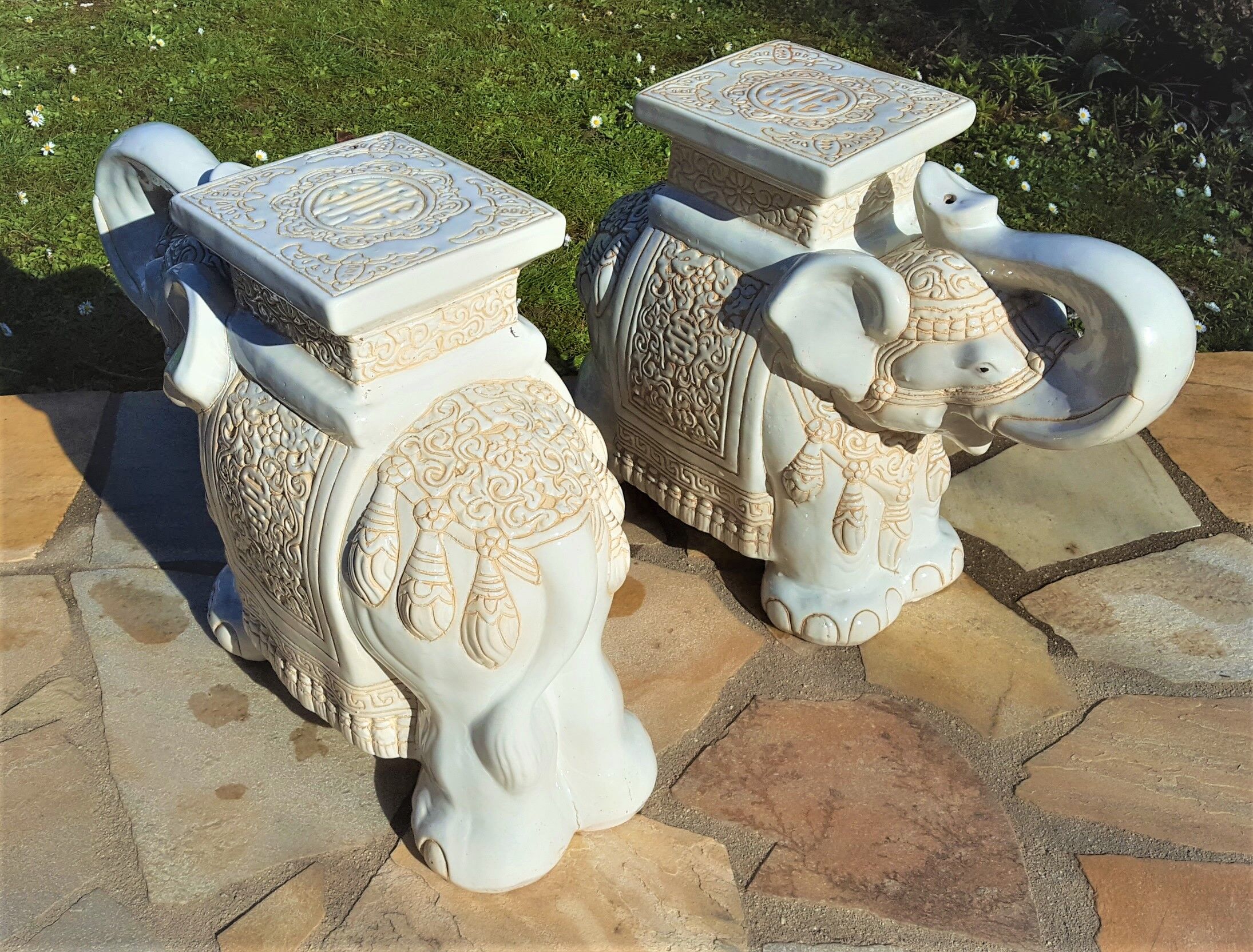 Pair of enamelled white ceramic elephant harnesses