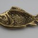 Empty bag brass fish England