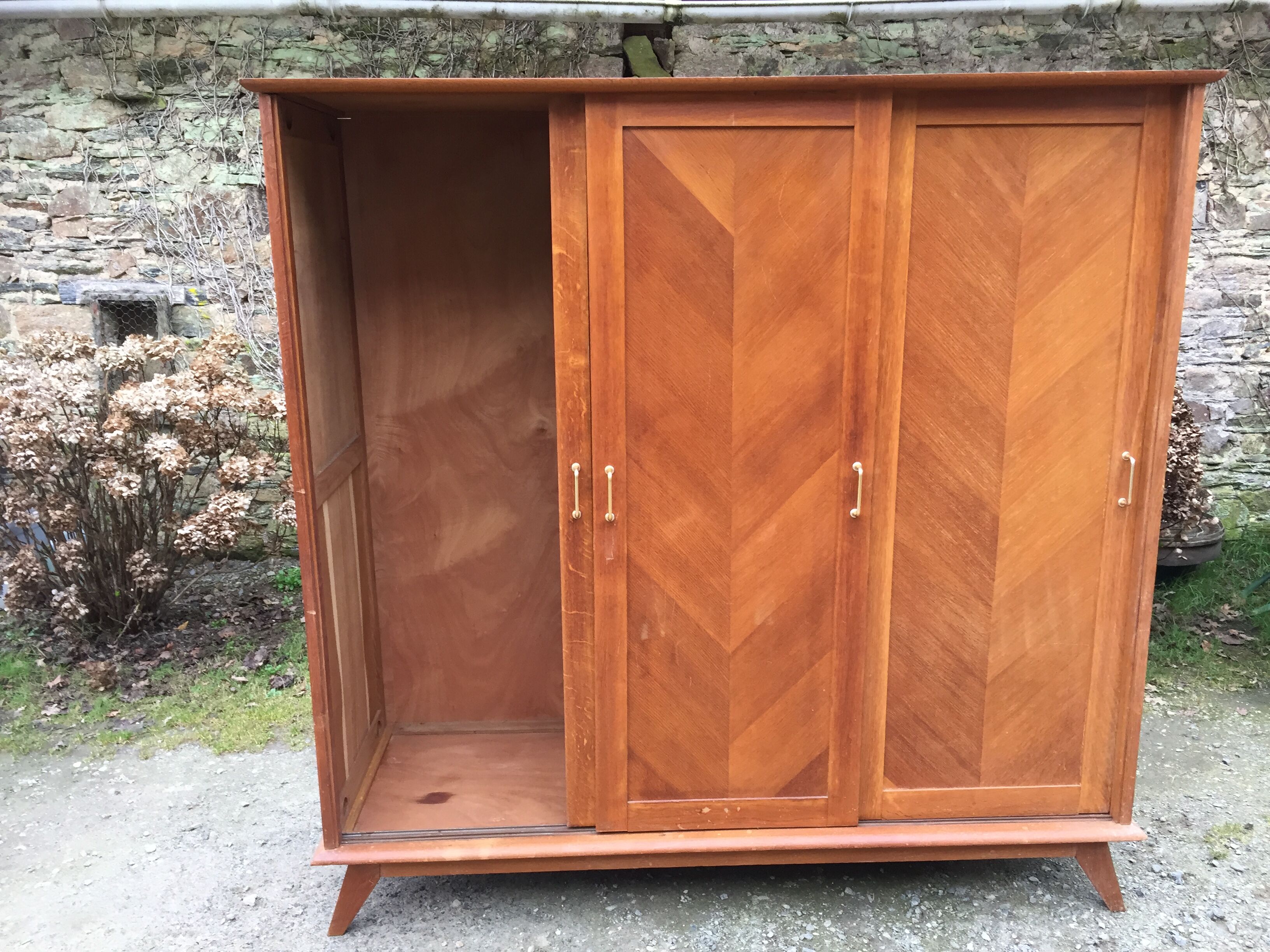 Vintage wardrobe compass feet with 3 sliding oak doors.