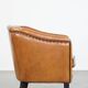 Sheep leather club chair finished with black piping