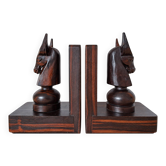 Pair of vintage wooden bookends with stylised horse heads.