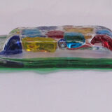 Empty millefiori-style glass pocket