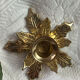 Pair of candlesticks, holly leaves, in brass