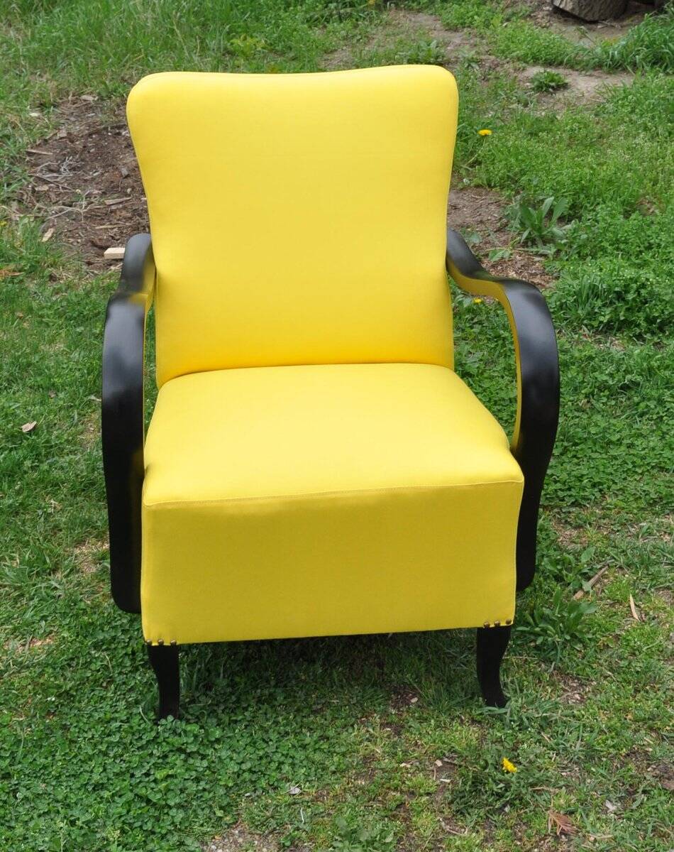 Art Deco armchair in yellow and black, made of painted wood and cotton, high back, 1920s.