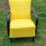Art Deco armchair in yellow and black, made of painted wood and cotton, high back, 1920s.