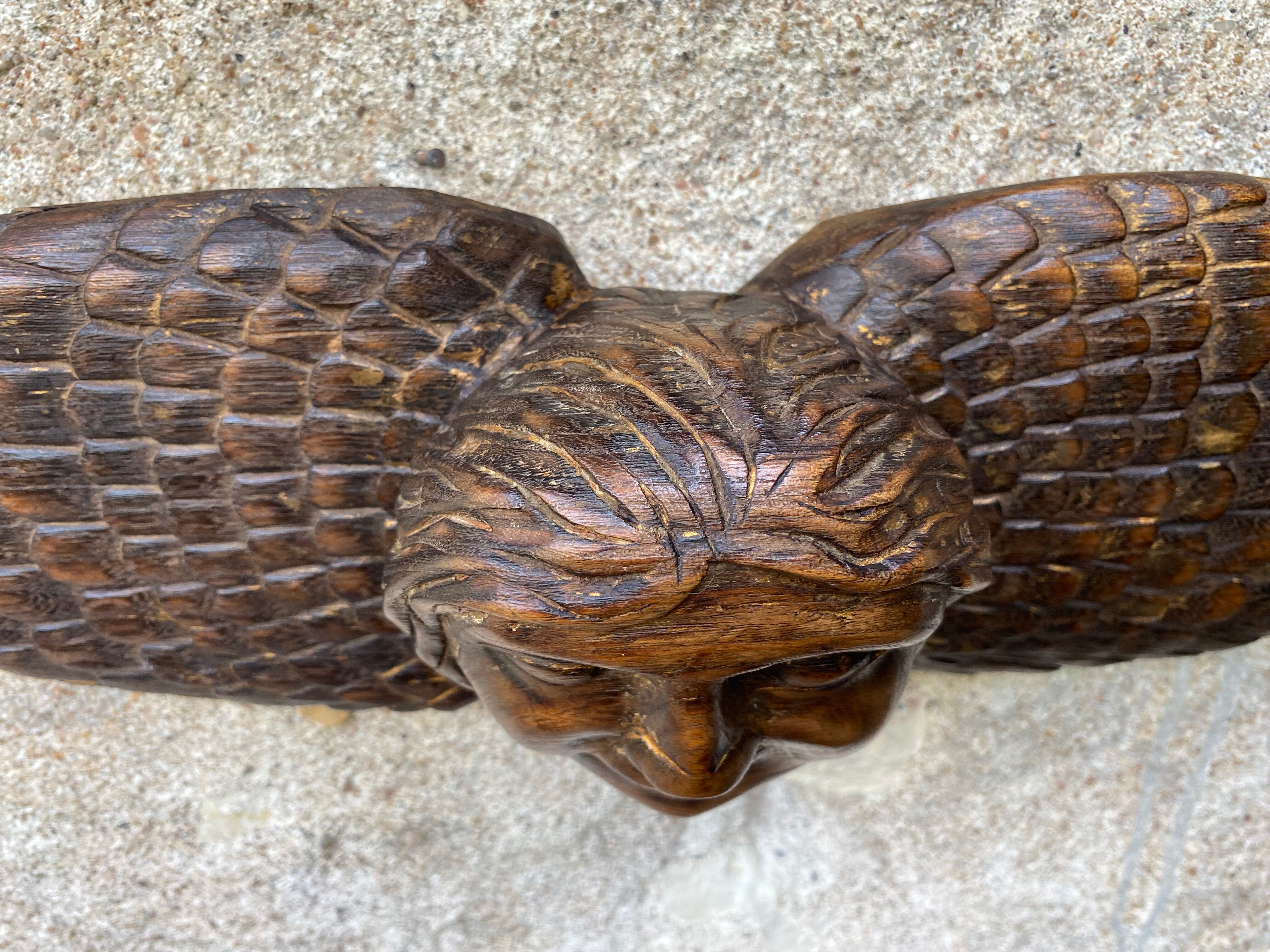 Carved wooden angel head