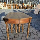 12-foot round oak table with 7 extensions / 20 people