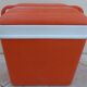 Glaciere vintage de couleur orange avec poignet  de marque EDA