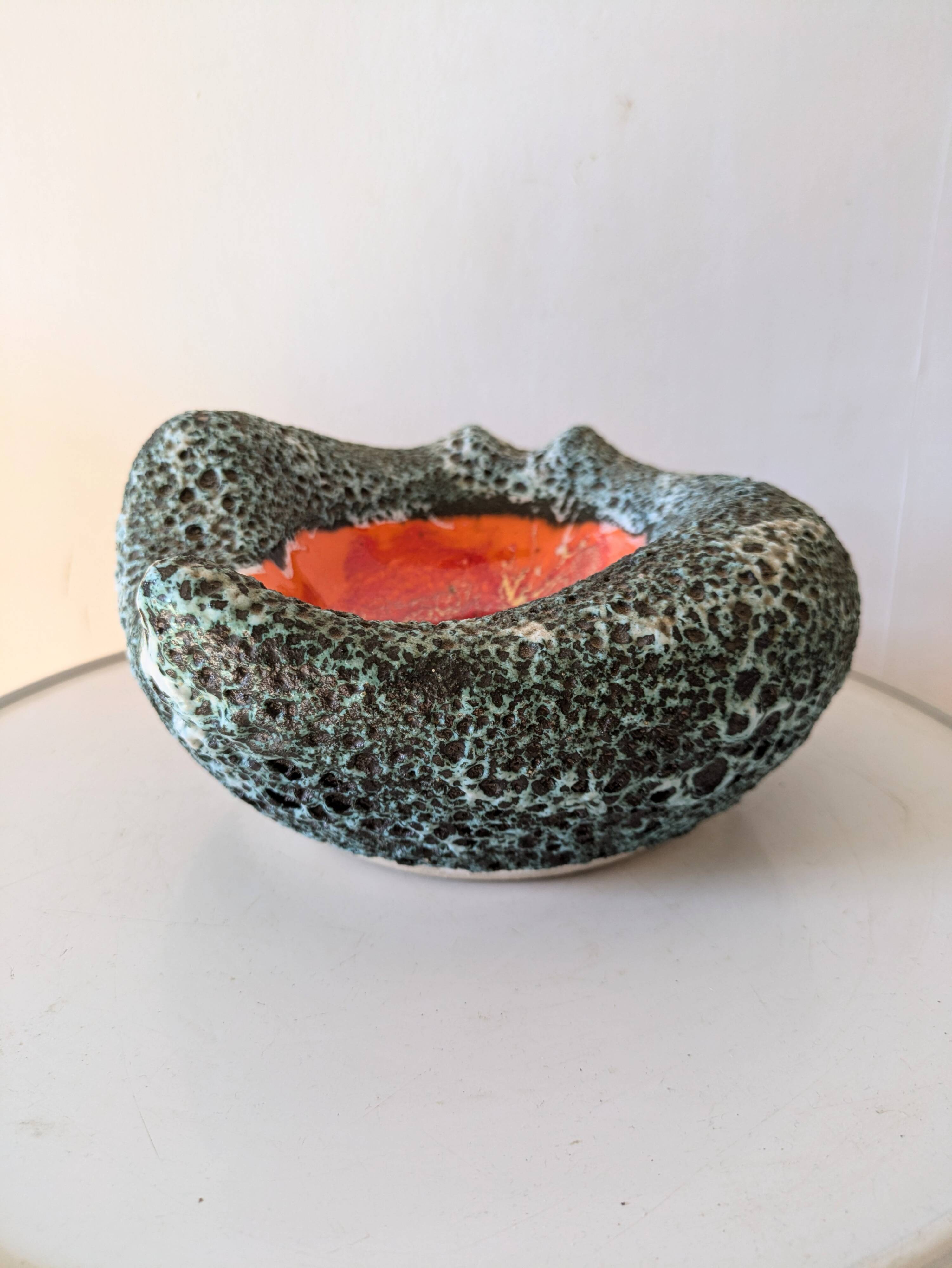 Volcanic lava pocket emptier, 70s design