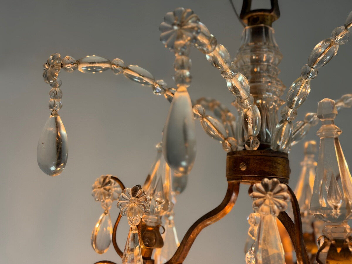 Bronze cage chandelier adorned with crystal drops, circa 1880