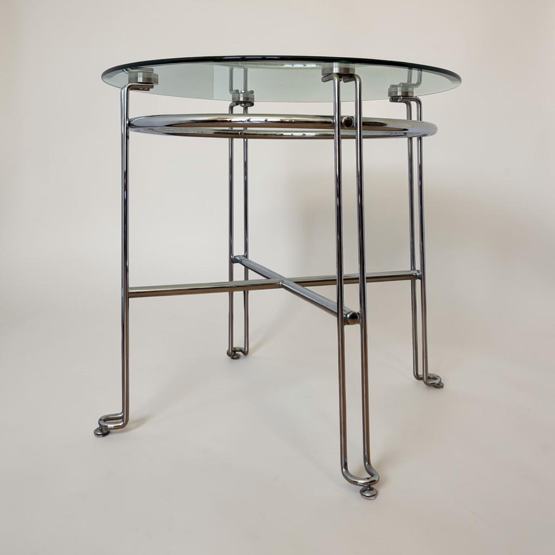 Chrome metal and glass tubular table