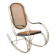 Modernist rocking chair in gilded brass and cane.