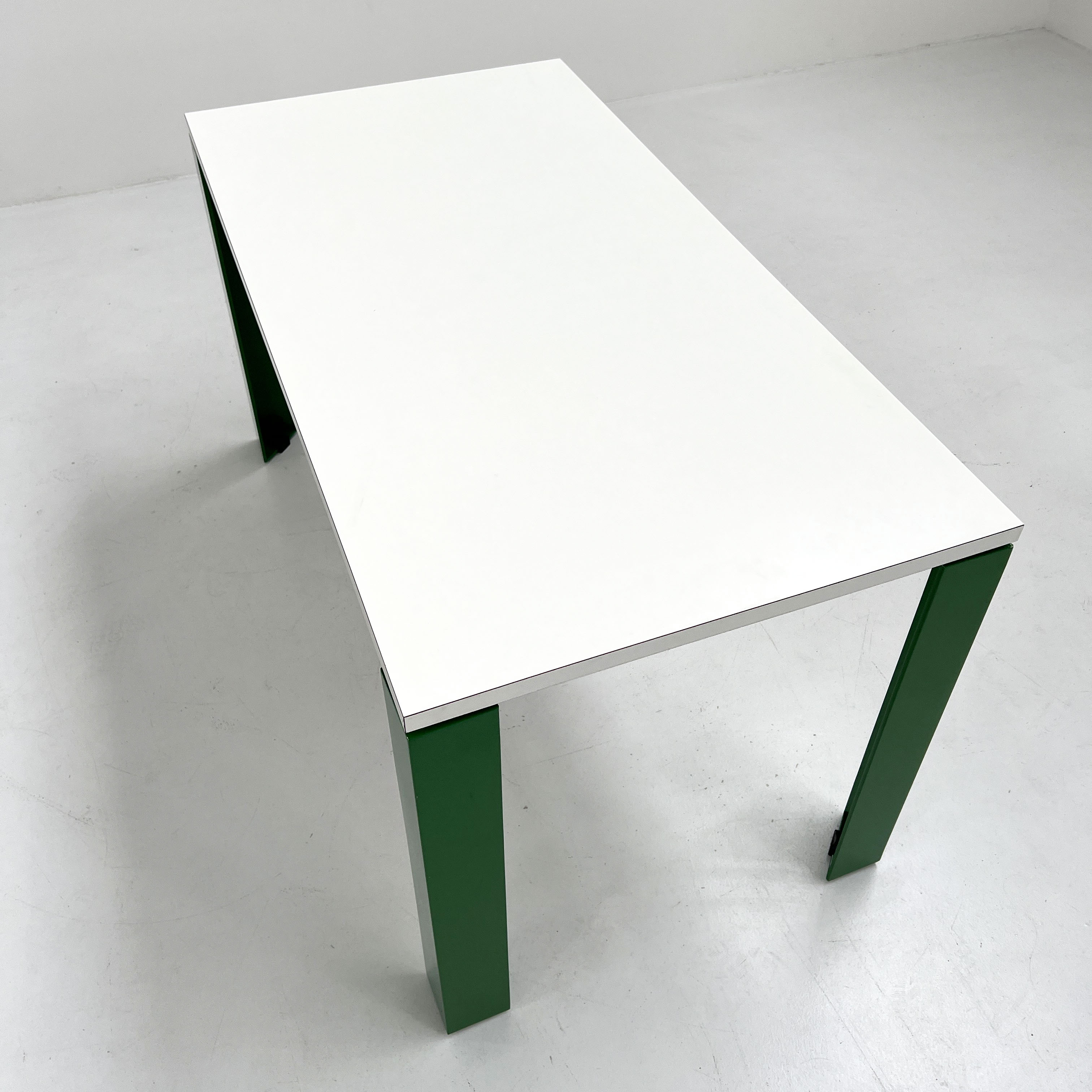 Eretteo dining table with green feet by Orni Halloween for Artemide, 1970