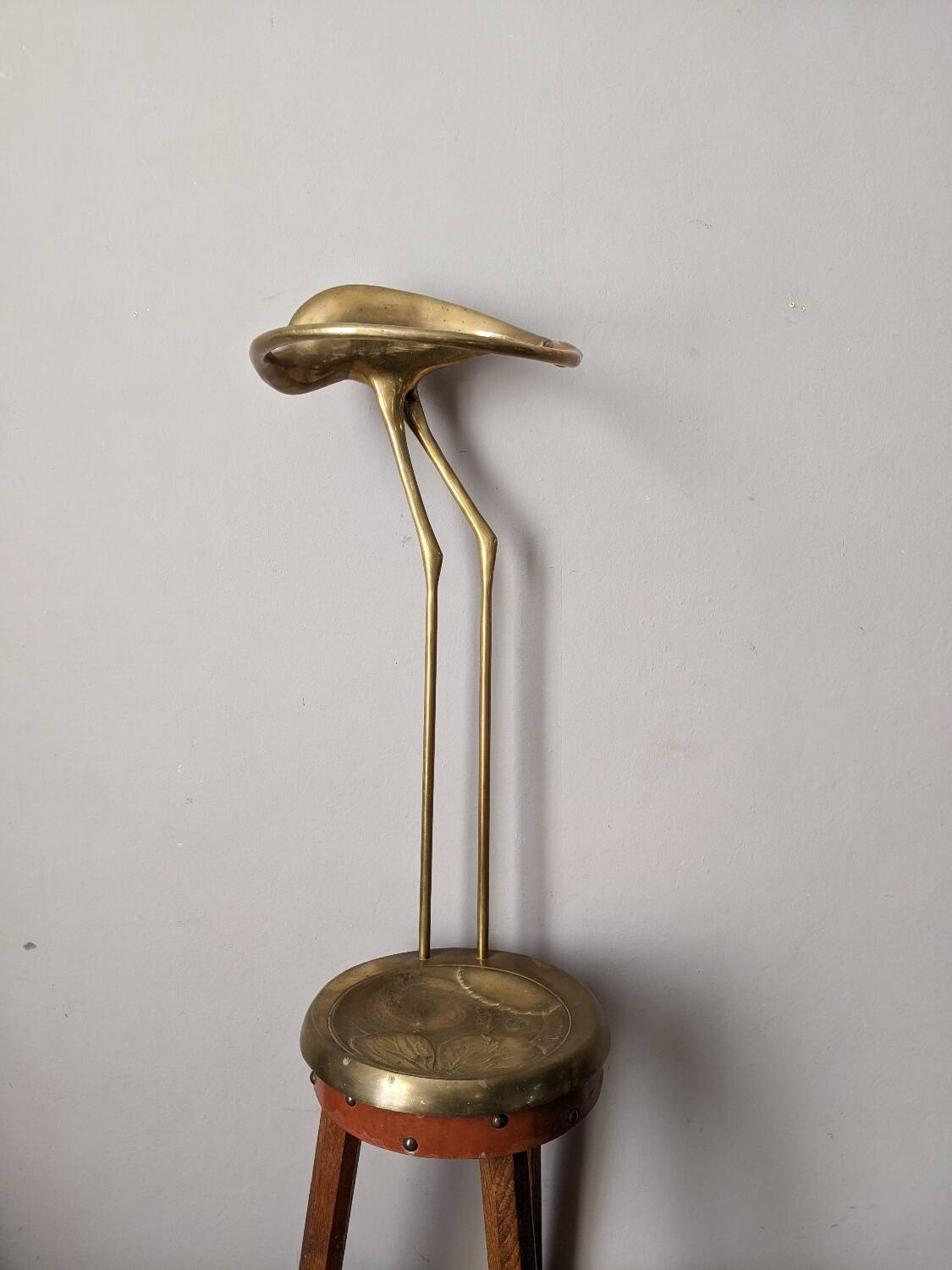 Curved brass umbrella stand