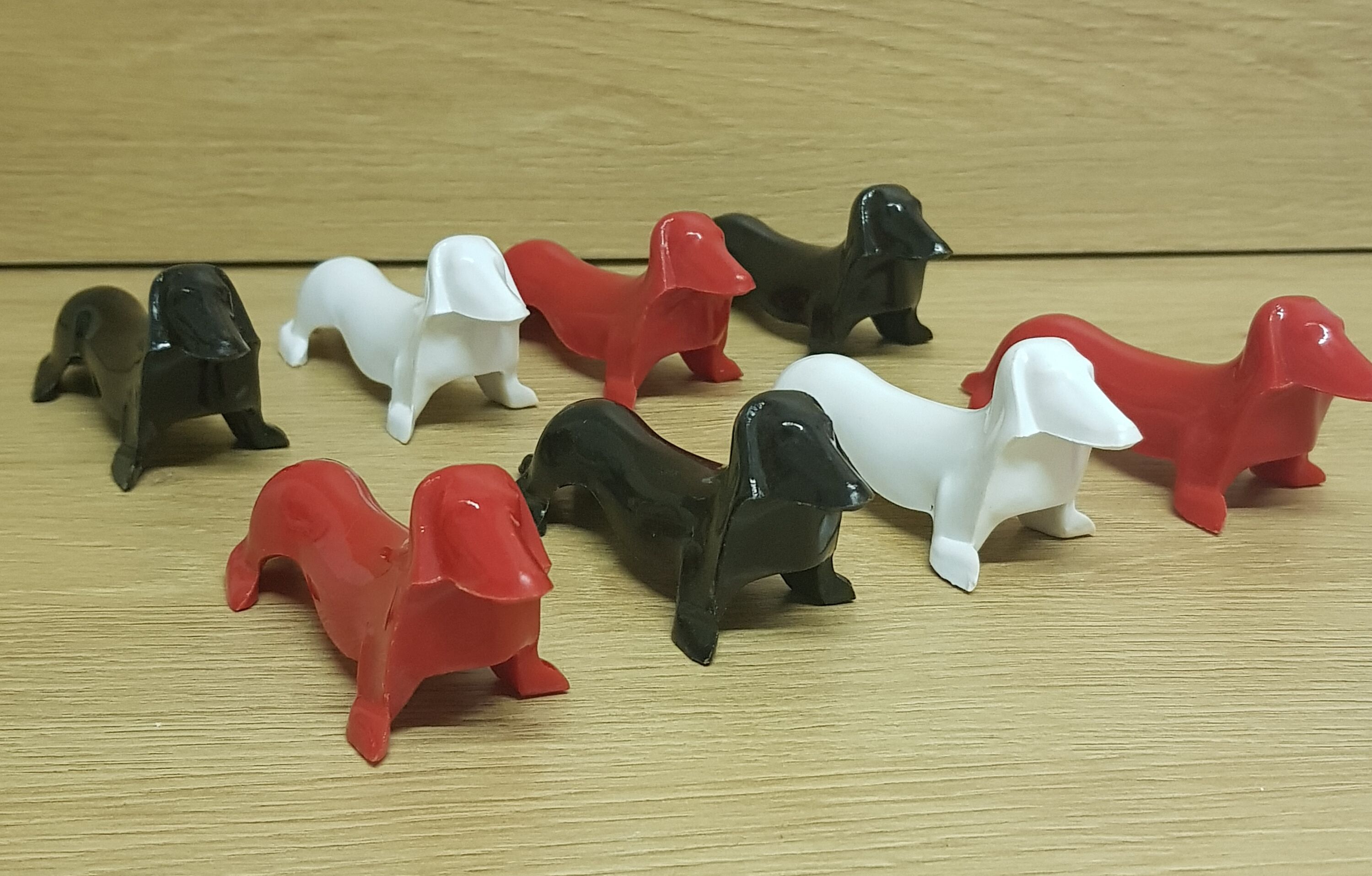 Plexiglass sausage dog cutlery rests