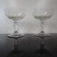 2 coupes à champagne anciennes en verre soufflé facetté