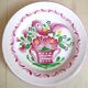Assiette plate à décor St-Clément corbeille fleurie et oiseau
