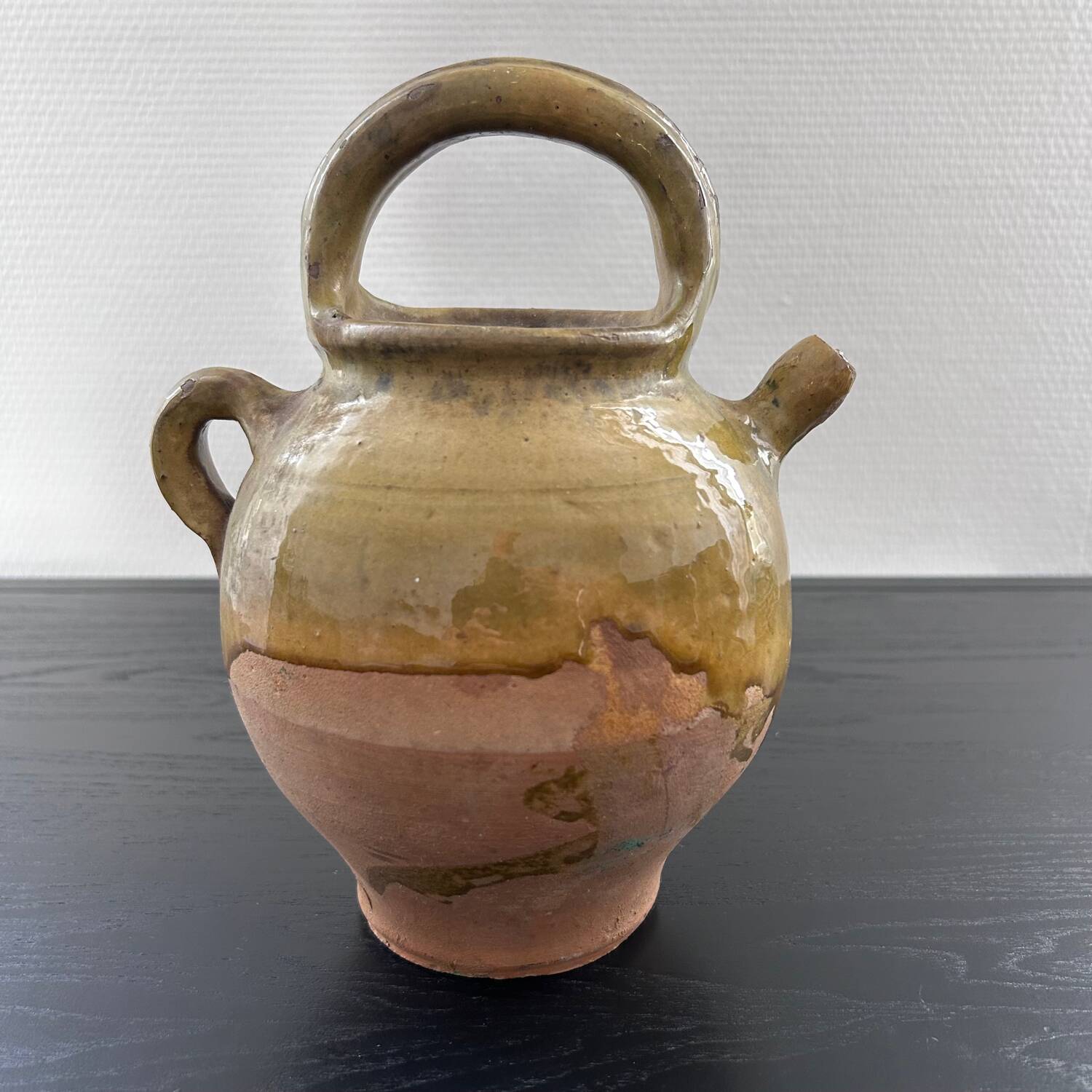 Antique two-material water jug