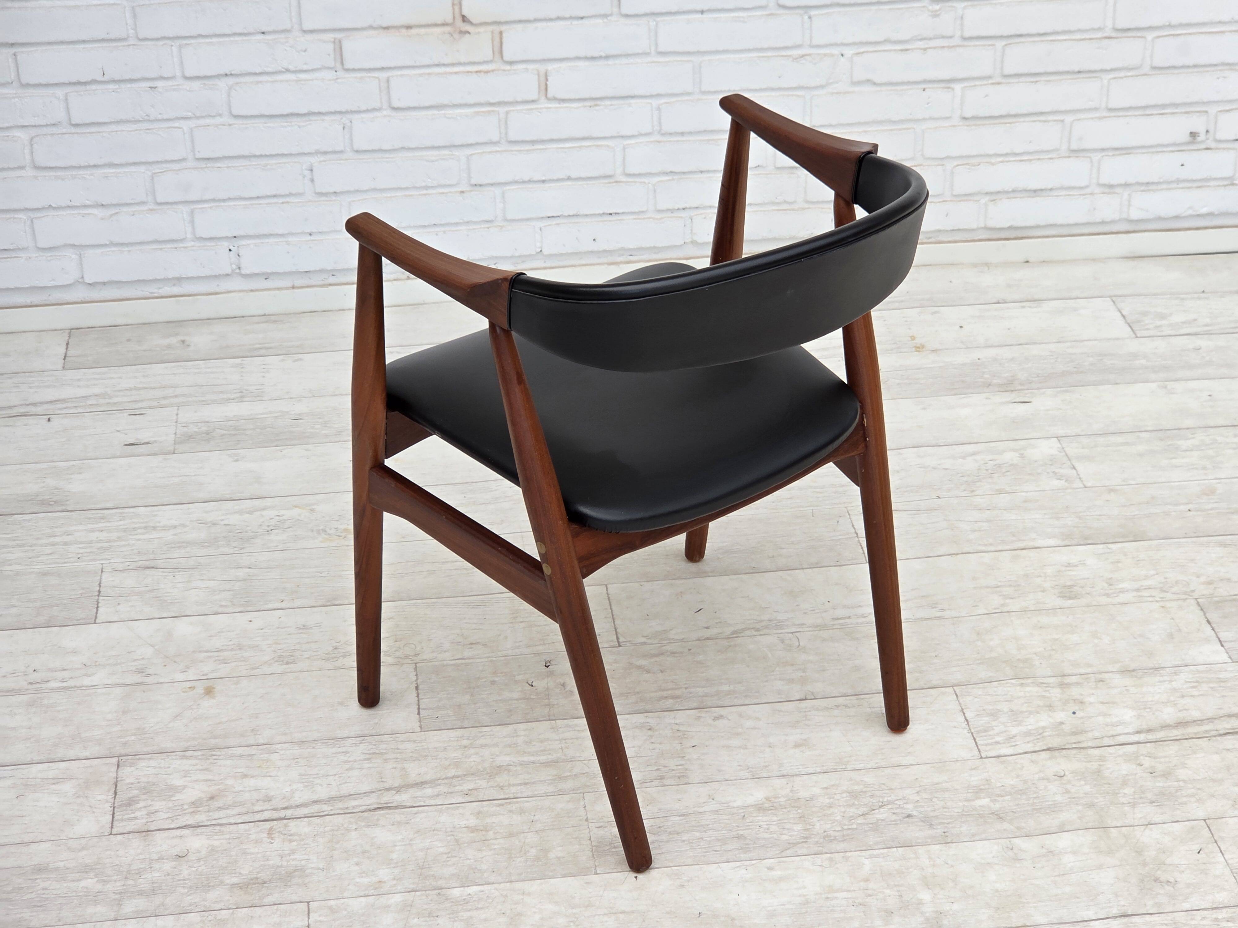 1960s, Danish armchair. Teak wood, black artificial leather.