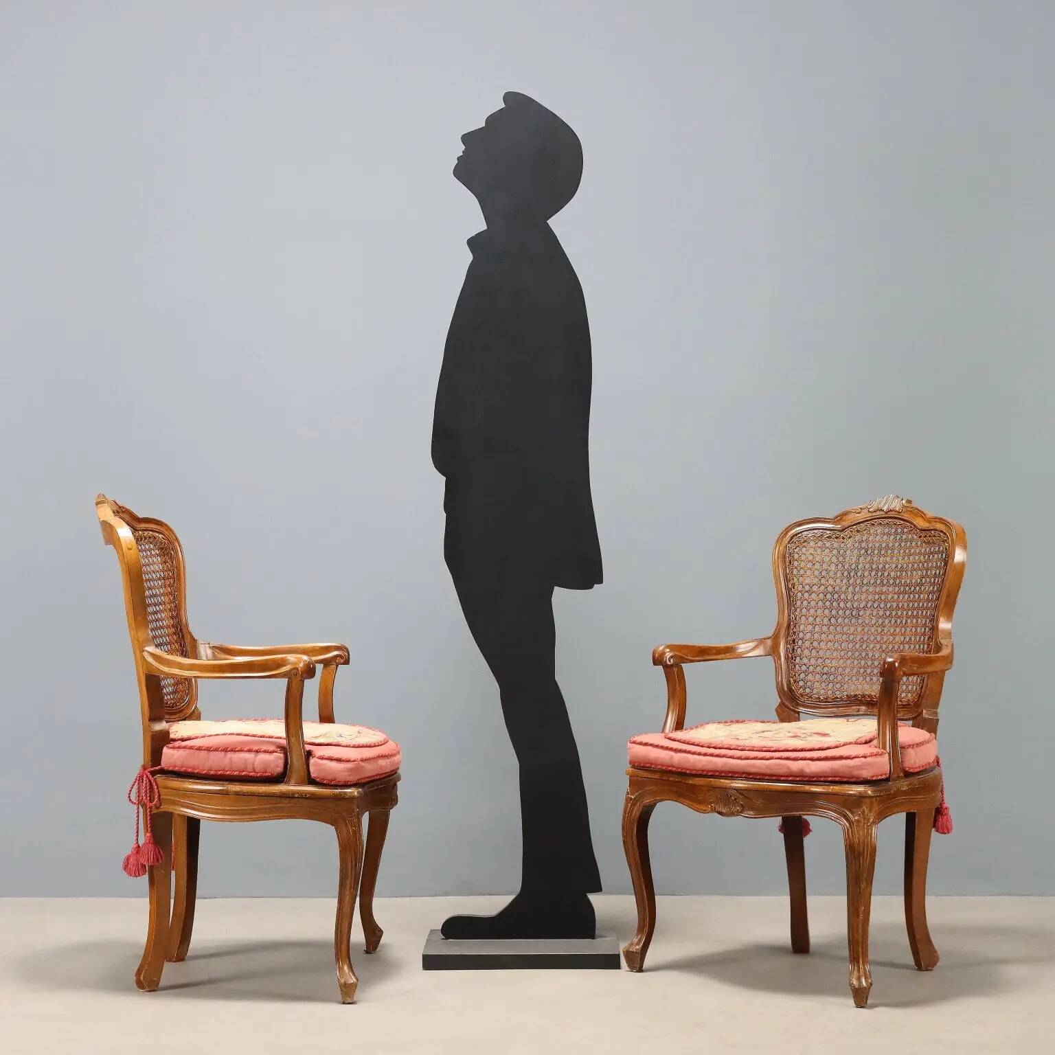 Antique baroque-style armchairs in walnut and fabric, 19th century.