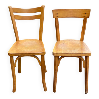 2 Scandinavian bistro chairs by Baumann in light wood from 1980.
