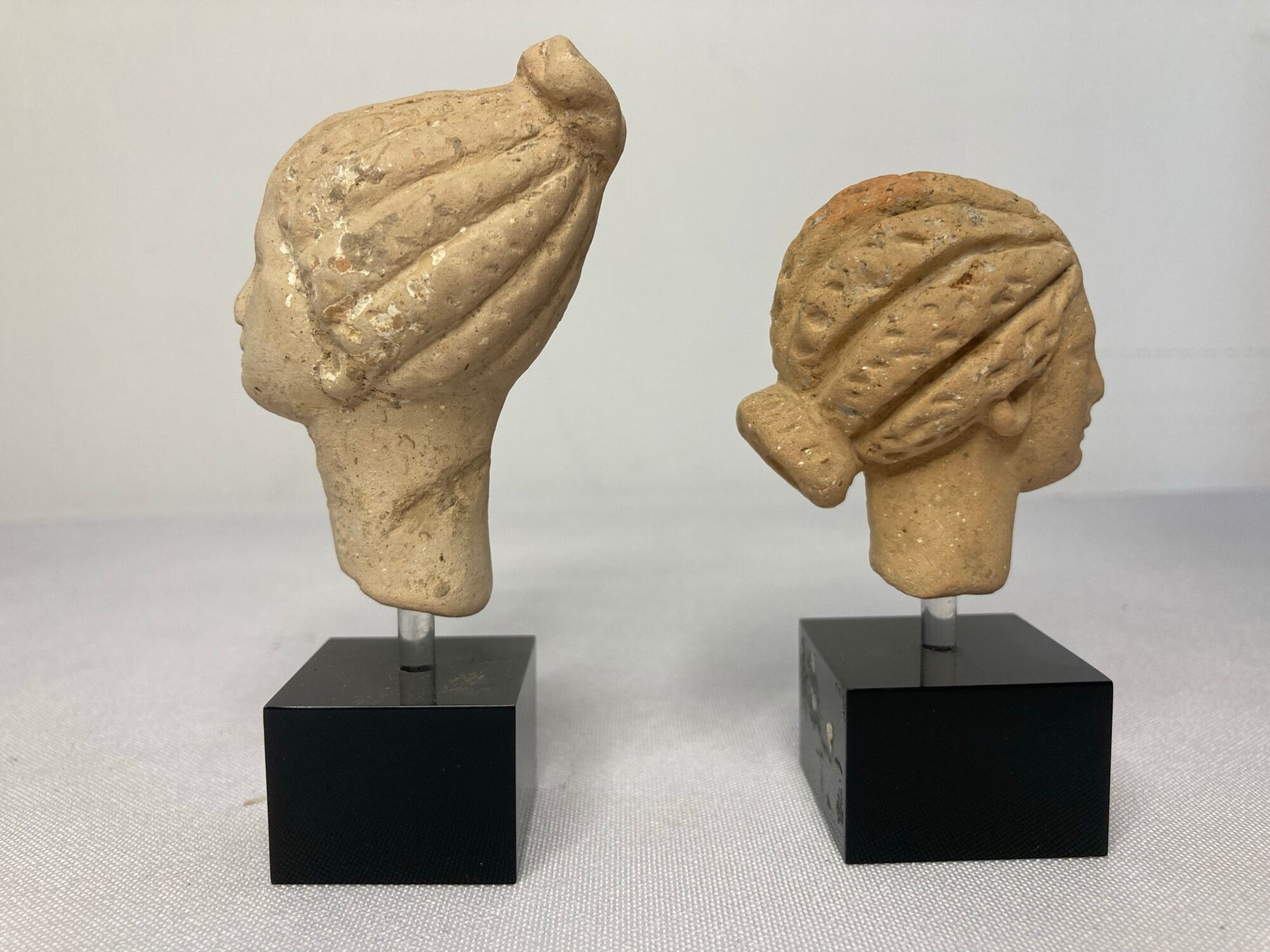 Antiquity two heads Greek woman with terracotta bun