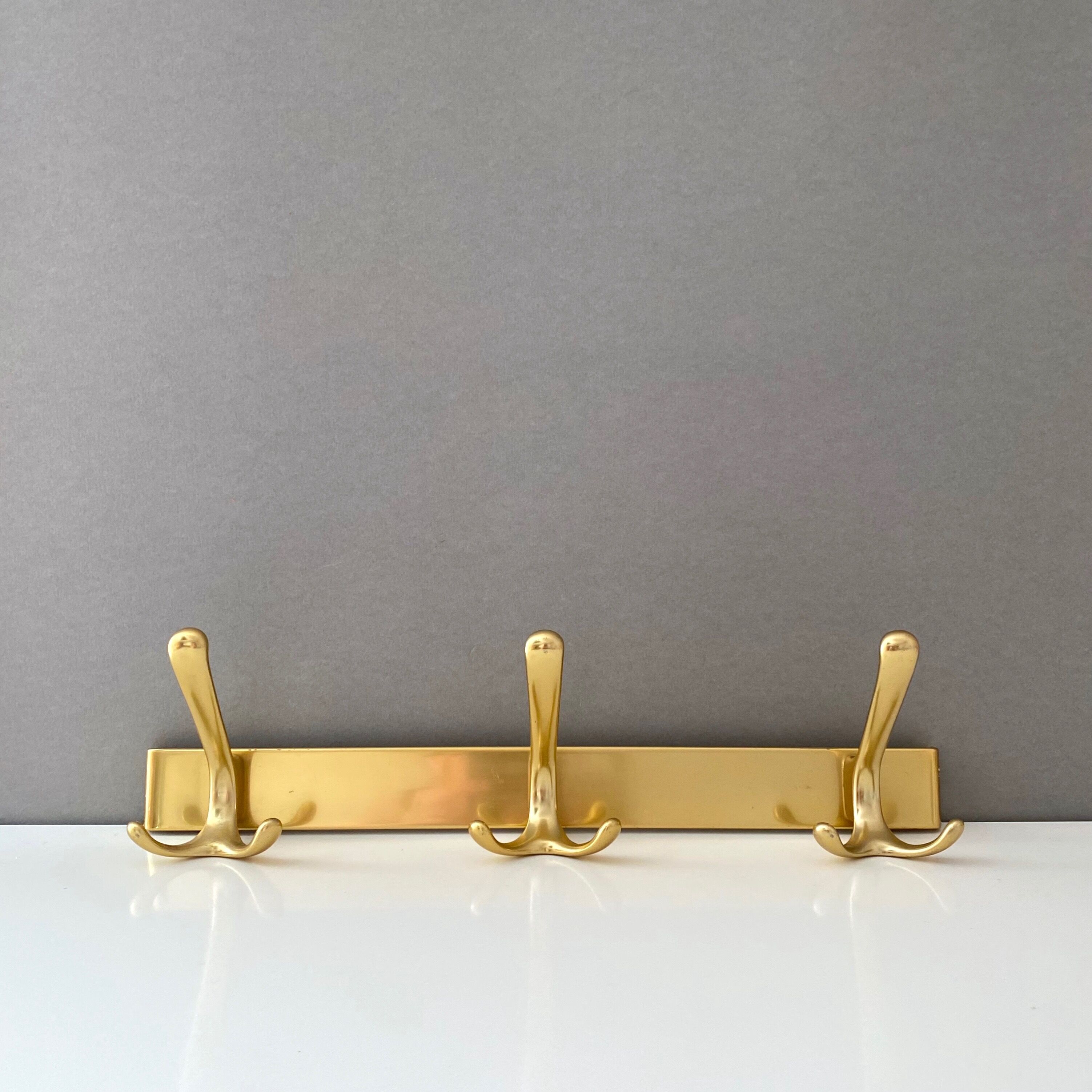 Vintage brass coat rack