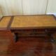 table-tier English lion feet, cherry and leather