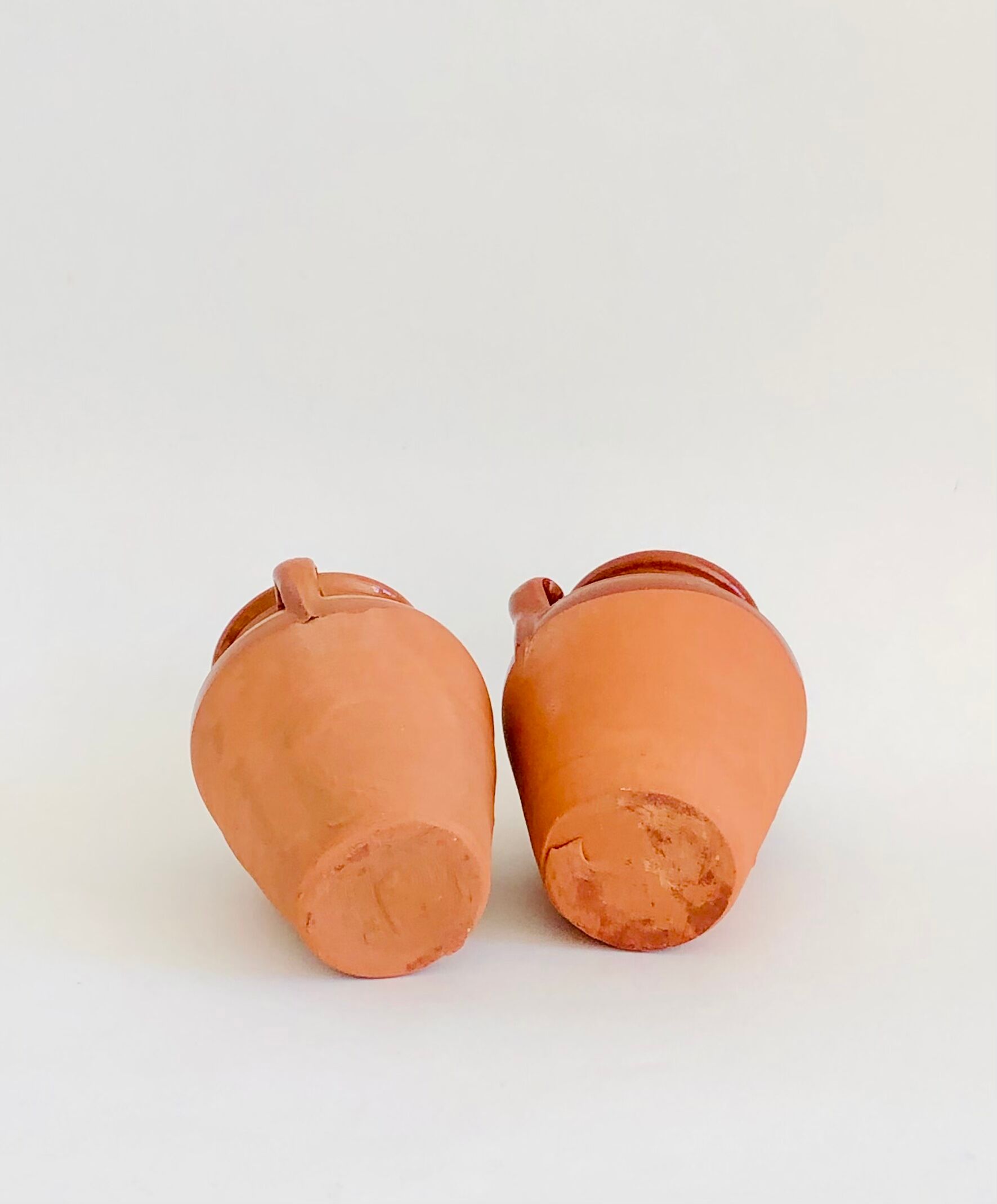 Pair of terracotta amphora vases