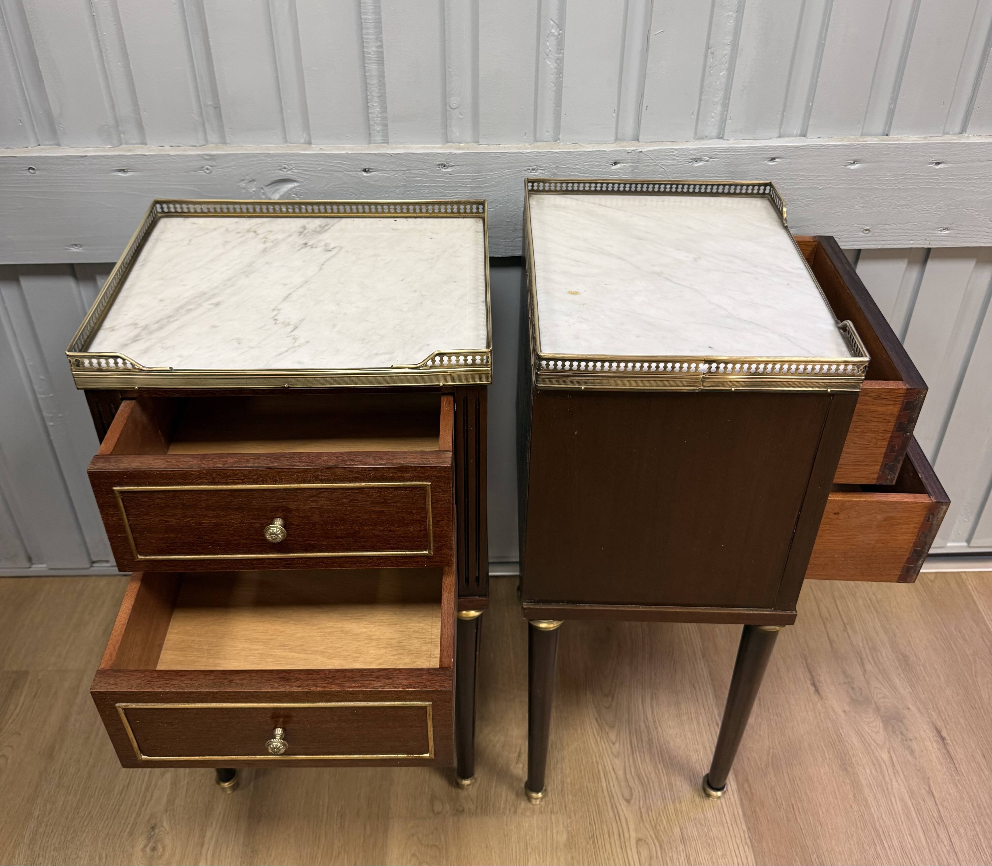 Pair of Louis XVI style bedside tables in mahogany