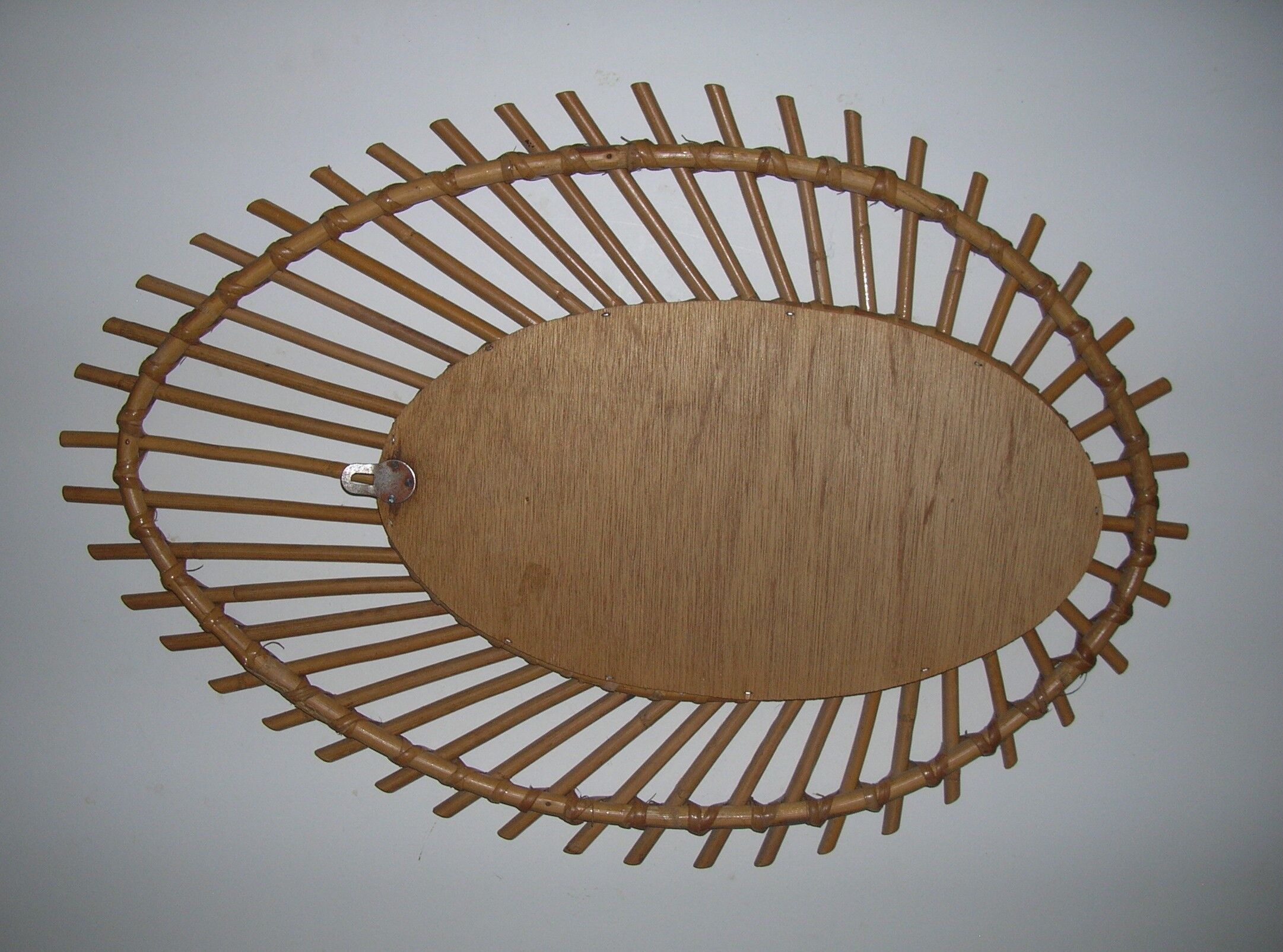 Oval rattan mirror model "almond" 42x62cm