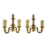 Old pair of wall sconces with double fires in bronze, seventies
