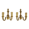 Old pair of wall sconces with double fires in bronze, seventies