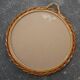 Small round mirror with rattan frame, vintage 70s