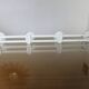 Wall coat rack with 4 hooks in white lacquered metal 1970