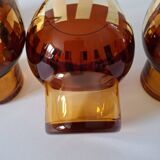 Carafe and its amber/gold glasses from the 70s