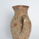 Pitcher in old sandstone