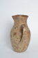 Pitcher in old sandstone